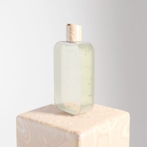 Pure vanilla extract bottle styled on a clean white background in warm earth tones